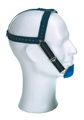Vertical-pull headgear for chin cap therapy, rigid chin cap